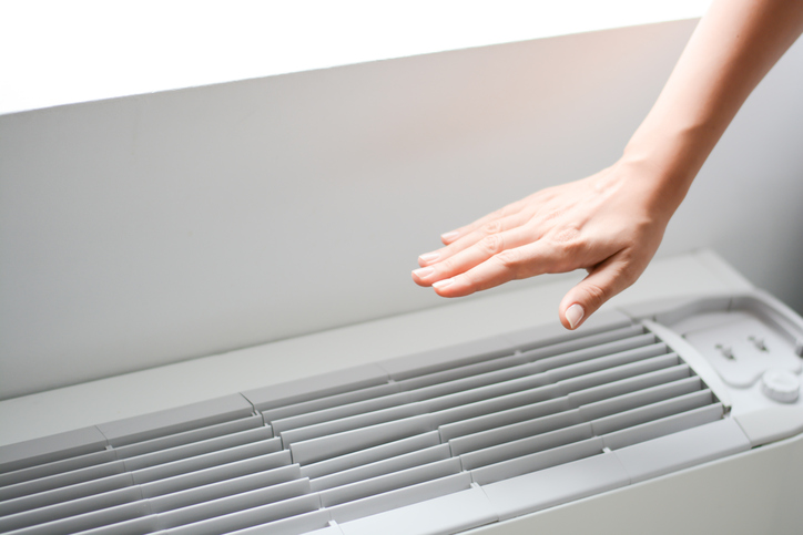 Check air conditioner heat or room temperature